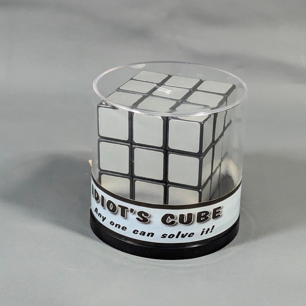 Idiot's Cube Novelty Gag Gift 3x3 Puzzle Silver All Sides Joke Toy with Case